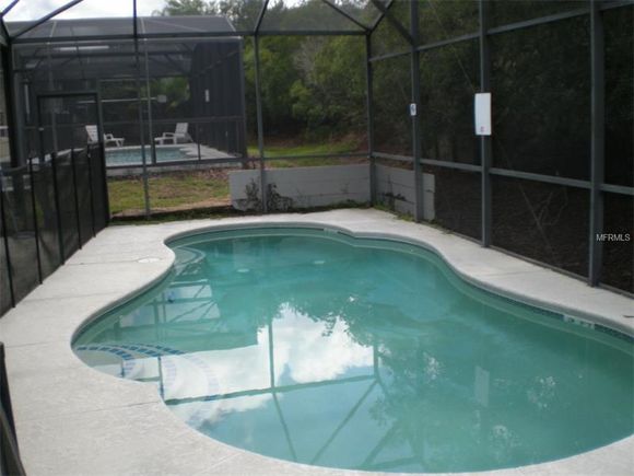 Home with Pool near amusement parks in Orlando $219,950 